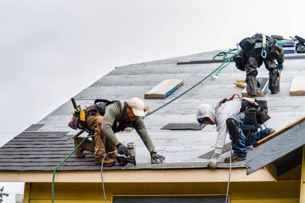 Professional Gutter Installation technician working in Slingerlands, NY